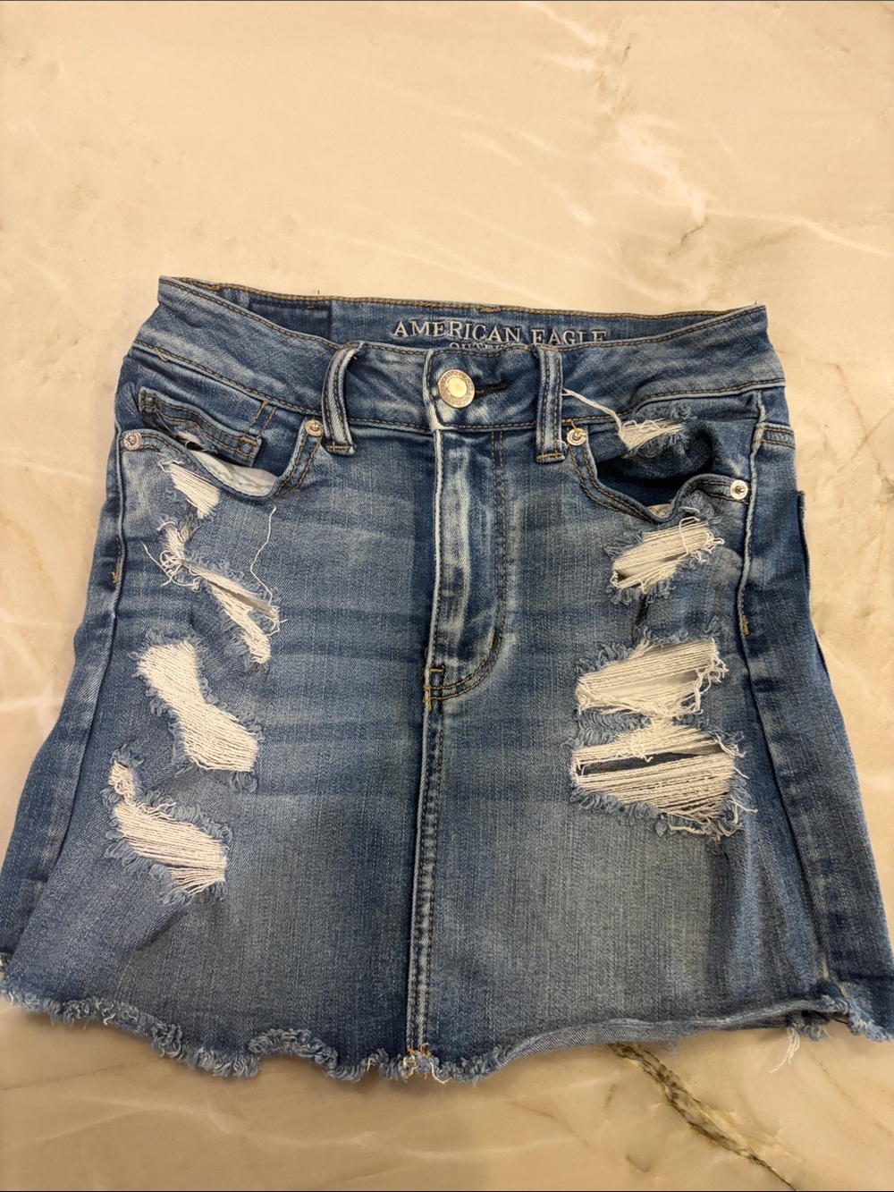 American Eagle Outfitters Light Blue Distressed Denim Mini Skirt